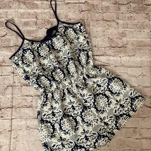 Charlotte Russe white/navy blue straps romper size M.